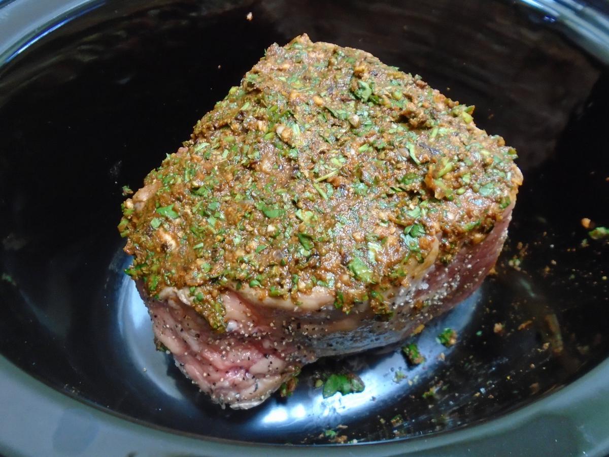 Season a 500g joint of beef with salt & pepper, place in a slow cooker then spread the chipotle mix evenly over each side