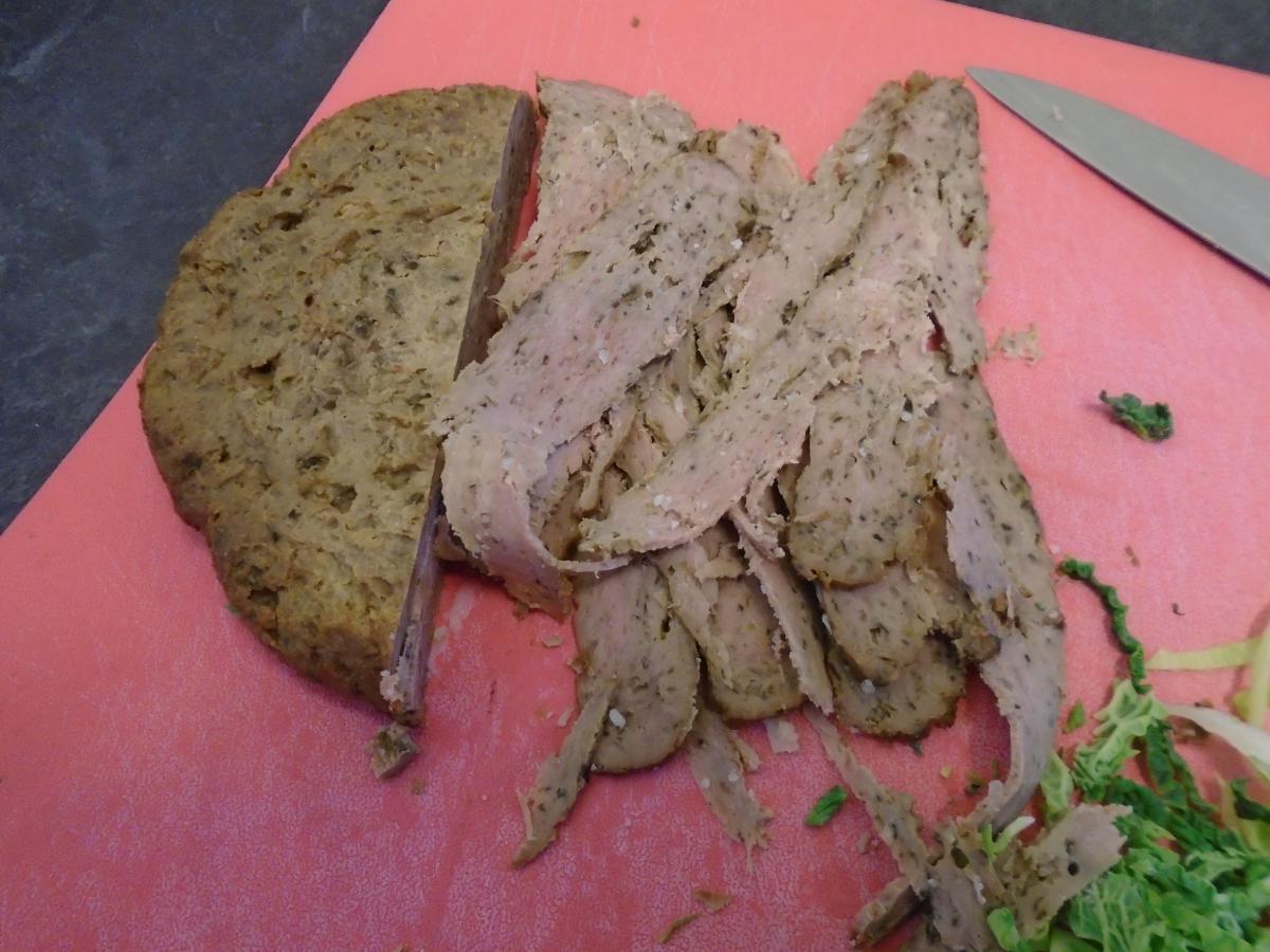 Once cooked, take a sharp knife and slice very thin strips from the doner meat