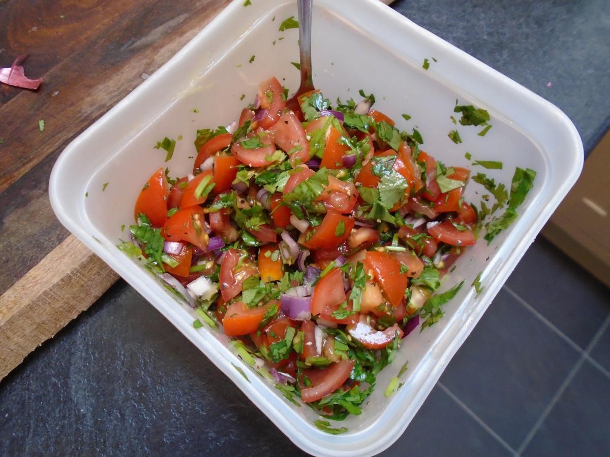 Make the pico de gallo by roughly chopping 30g red onion, 200g tomatoes & 20g coriander and mixing with the juice of ½ lime & 1 tsp olive oil