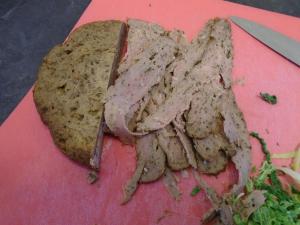 Once cooked, take a sharp knife and slice very thin strips from the doner meat