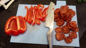 Thinly slice 150g chorizo and 2 peppers