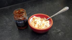 Mix 4 tbsp yoghurt with 1 heaped tsp harissa