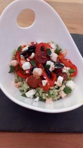 In the morning, sprinkle feta and torn up mint leaves the couscous and chorizo mix