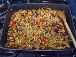 Mix the cooked pasta into the veg with 60g pesto and season