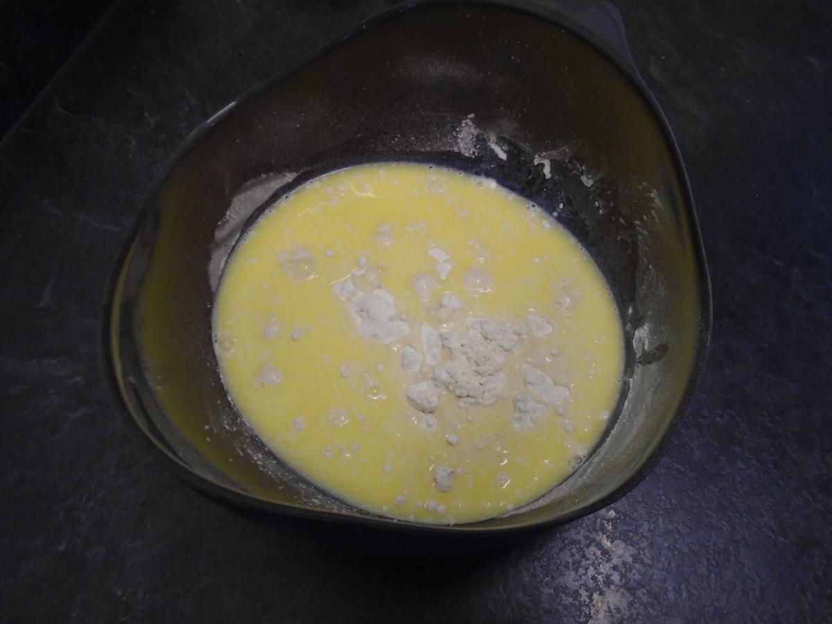 Add the melted milk & butter to 300g plain flour